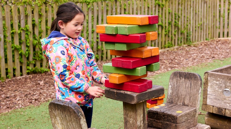 A child in the Story Book play area at Cliveden, Buckinghamshire